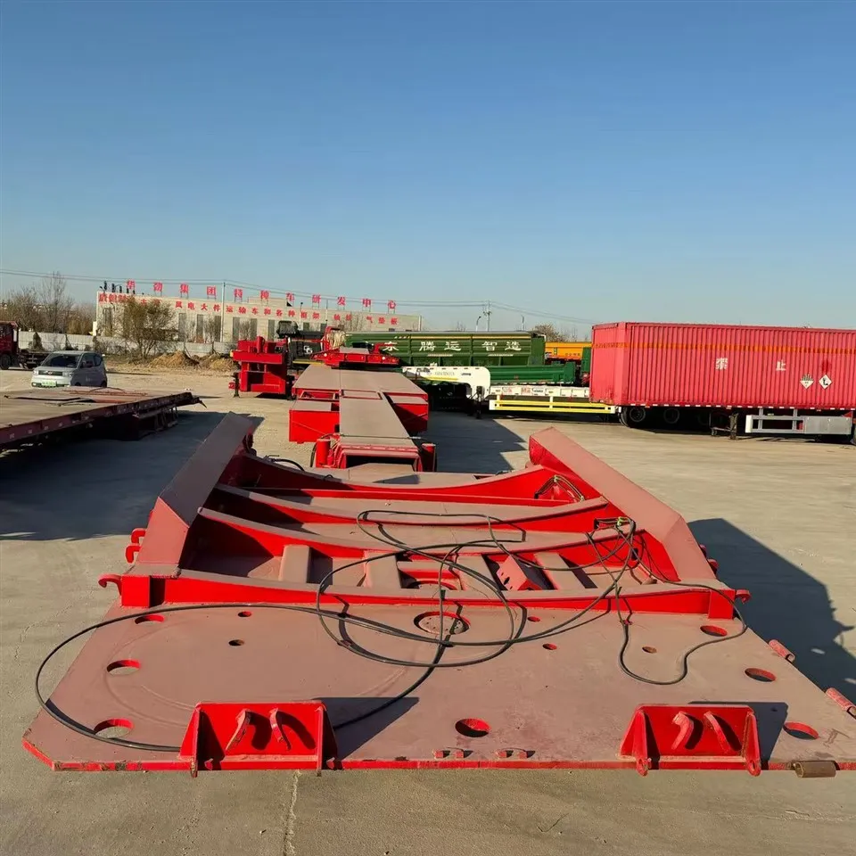 Zavodning ulgurji sotilishi moslashtirilgan 3 o'qli 60 tonna 4 o'qli 100T po'latdan past bo'lgan yarim romork past yotoqli yuk ko'taruvchi yuk mashinasi treyleri sotiladi